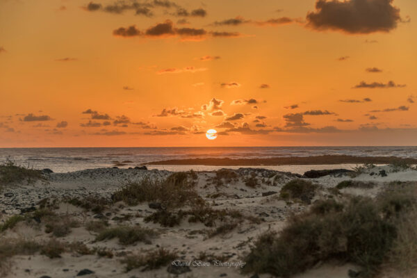 Fotografía de una puesta de sol en Cotillo, Fuerteventura, capturada por David Báez